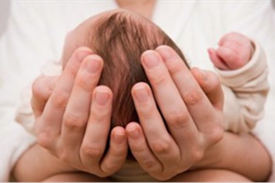 Mother Holding Baby Photo